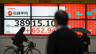 Japan's Nikkei breaks bubble-era record