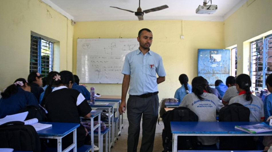 In Nepal's flood zone, teachers mourn students who never returned