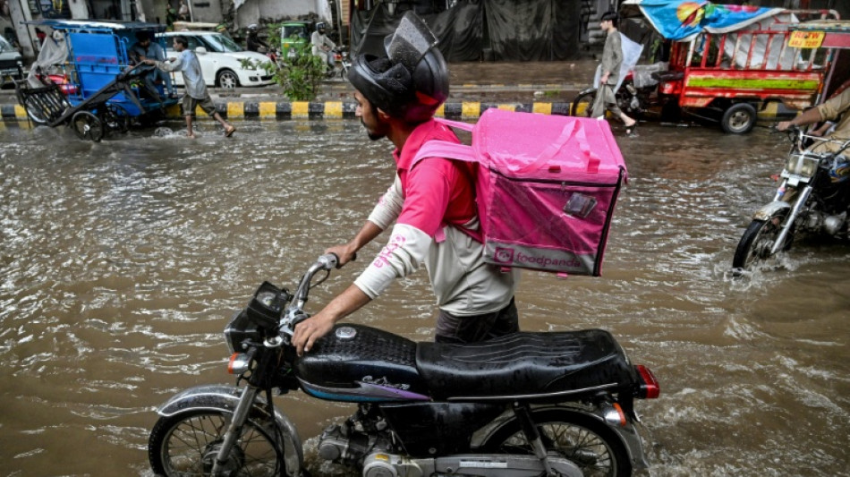 No pause for food delivery riders during Pakistan's monsoon