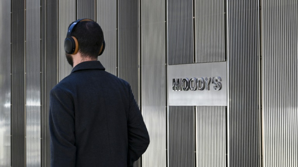 US loses last triple-A credit rating as Moody's cuts over govt debt