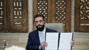 Syria's leader agrees truce deal with Kurds after govt troops advance