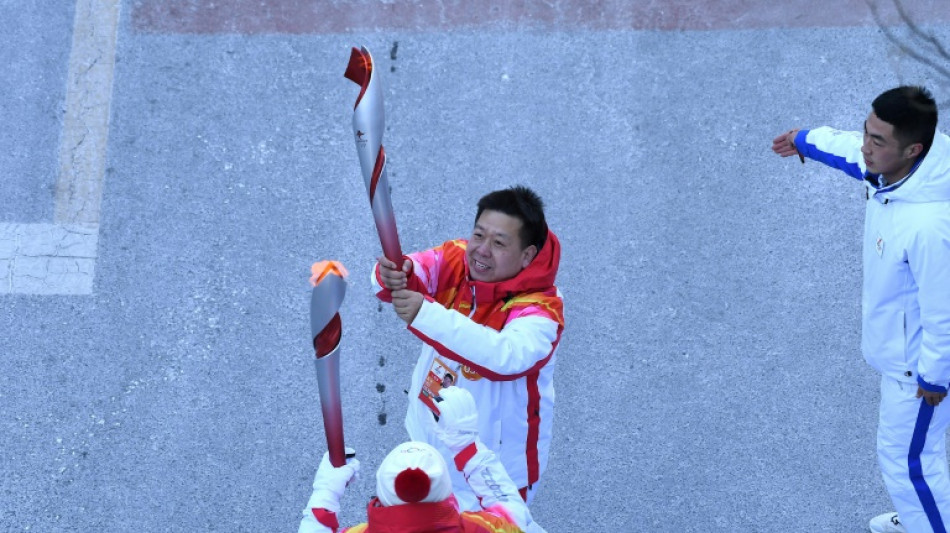 La llama olímpica llega a la Gran Muralla con Jackie Chan