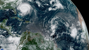 North Carolina coasts prepare for flooding as Erin churns offshore