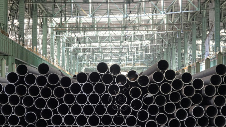 Stock markets mostly rise ahead of US economic data, tech earnings