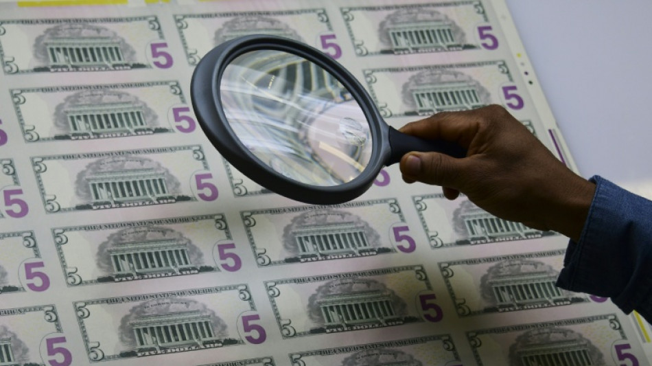 US stocks rise, dollar slides as Trump eyes new Fed boss