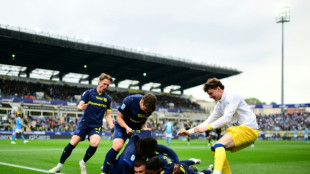 Napoli's title defence dented by draw at Parma