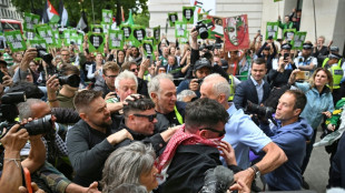 Kneecap rapper in court on terrorism charge over Hezbollah flag