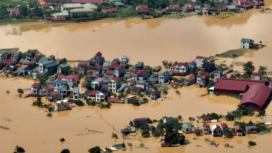 Thousands stranded as record floods submerge Vietnam streets