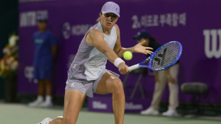Swiatek shrugs off double duty to reach Korea Open