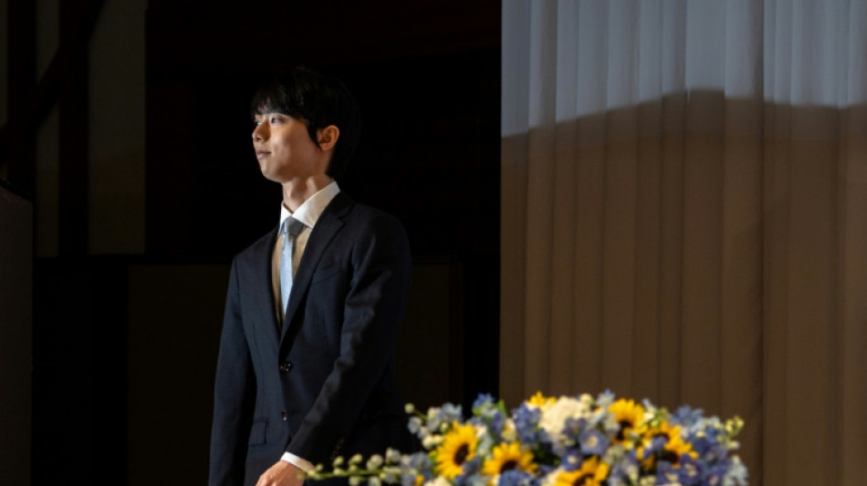 Japan skating star blames divorce on media harassment