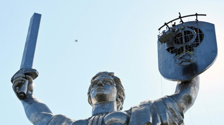Ukraine removes hammer and sickle from giant Kyiv statue
