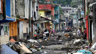 Flood-hit Mexican town digs out debris, fearing disease outbreaks