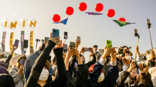 Tears, tattoos, Cartier watches: fan frenzy at BTS army discharge