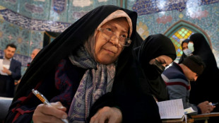 Iran counts ballots in vote seen favouring conservatives