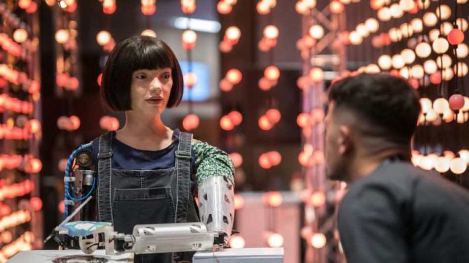 Humanoid robot says not aiming to 'replace human artists'