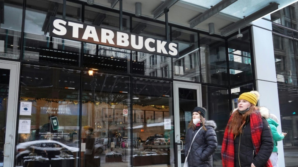 Starbucks reports higher profits, but Omicron adds costs