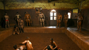 Rooted in the earth, India's traditional mud wrestling thrives
