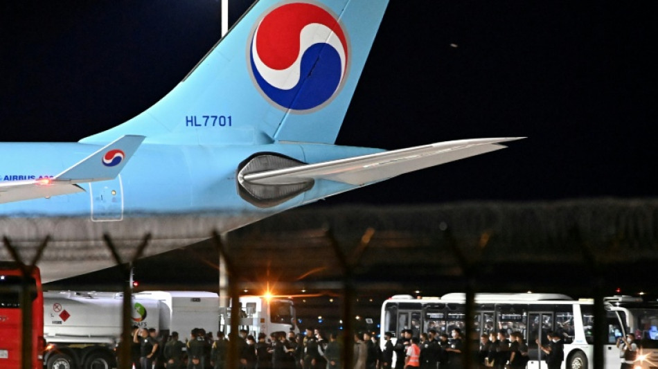 64 South Koreans held in Cambodia return home under arrest