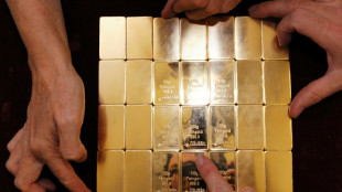 Gold hits record high as Iran shock triggers haven support