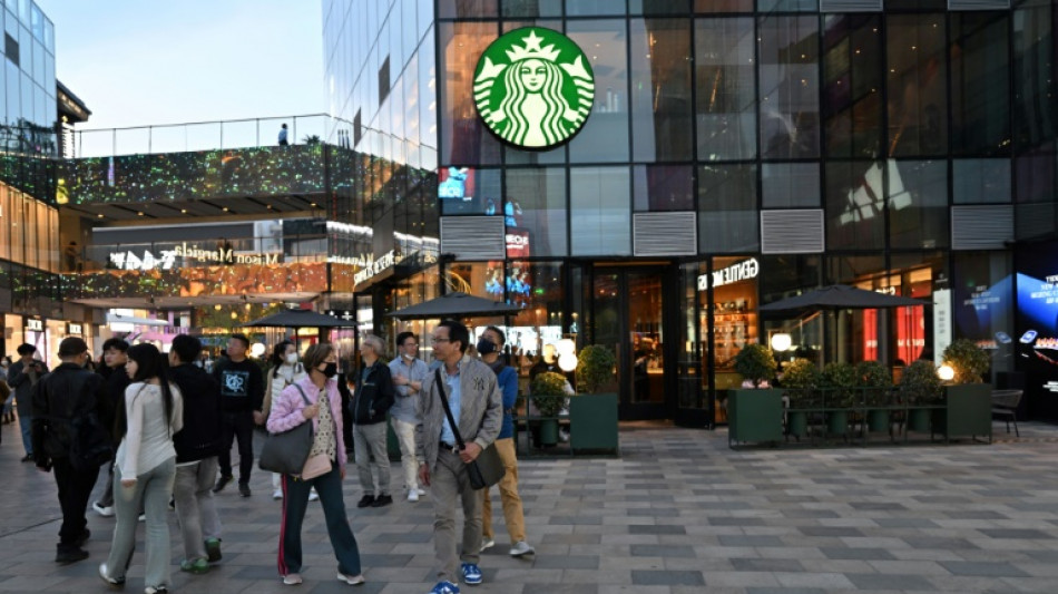 Starbucks receives bids for stake in China business: US media
