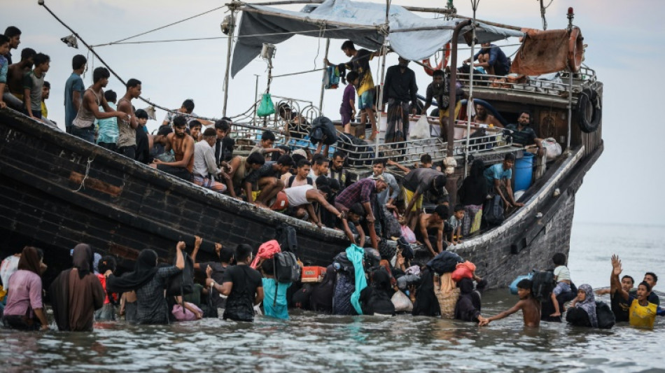 Rejected Rohingya boat sighted off Indonesia coast: official