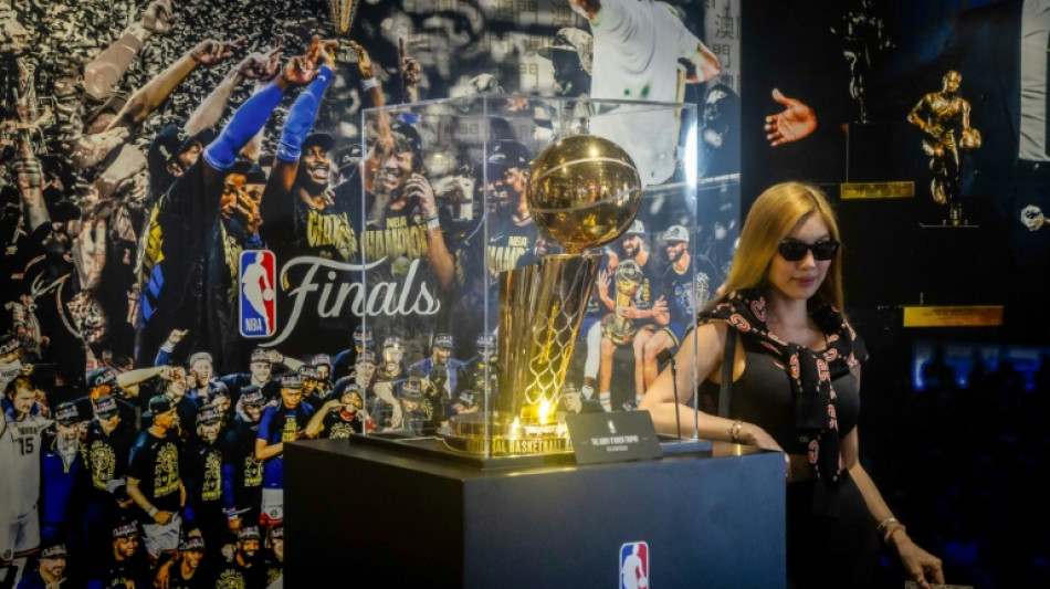 Treading fine line, NBA money machine kicks into gear on China return